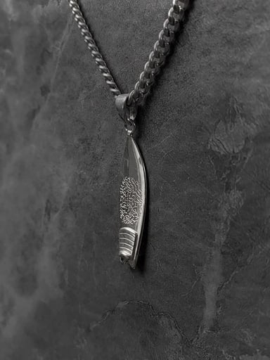 925 sterling silver fish surfboard pendant with coral wax engraving and dual fin detail – surf jewelry by Snow Cat Jewelry