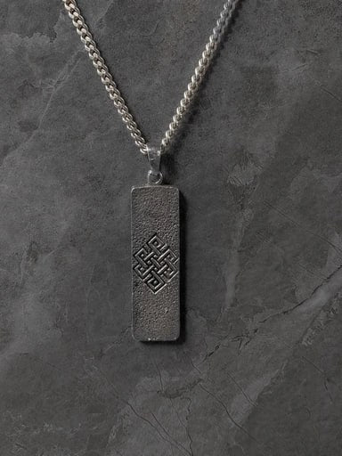 Back view of sterling silver Buddha pendant with engraved endless knot symbol – spiritual talisman by Snow Cat Jewelry