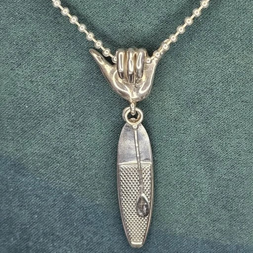 Sterling silver necklace with Shaka hand bail and detailed SUP paddleboard pendant on chain – surf jewelry by Snow Cat Jewelry