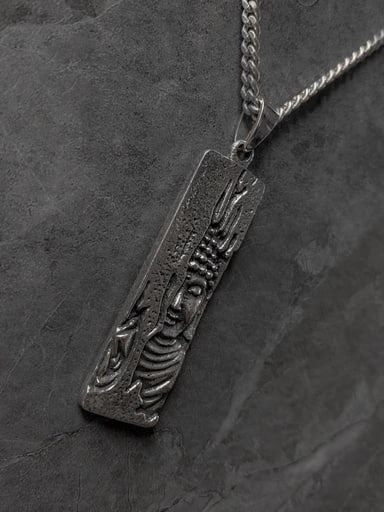 Sterling silver pendant with Buddha's face in deep relief – spiritual jewelry symbolizing peace and wisdom by Snow Cat Jewelry