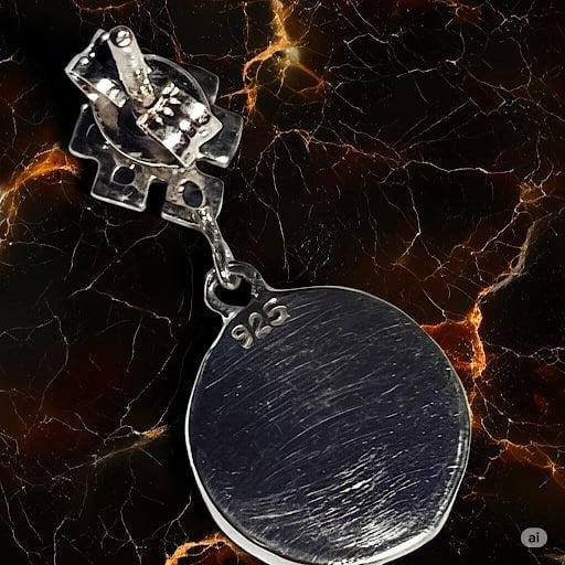 Back side of sterling silver earring showing 925 hallmark – part of Om and Endless Knot spiritual jewelry set by Snow Cat Jewelry