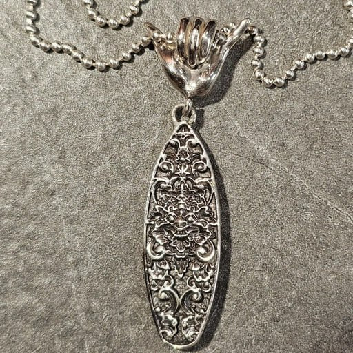 Sterling silver surfboard necklace with Shaka bail and intricate Balinese carving – Ocean Spirit pendant by Snow Cat Jewelry