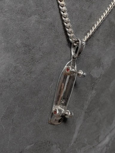 Sterling silver surfskate pendant with red cubic zirconia wheels – unique skateboard necklace by Snow Cat Jewelry
